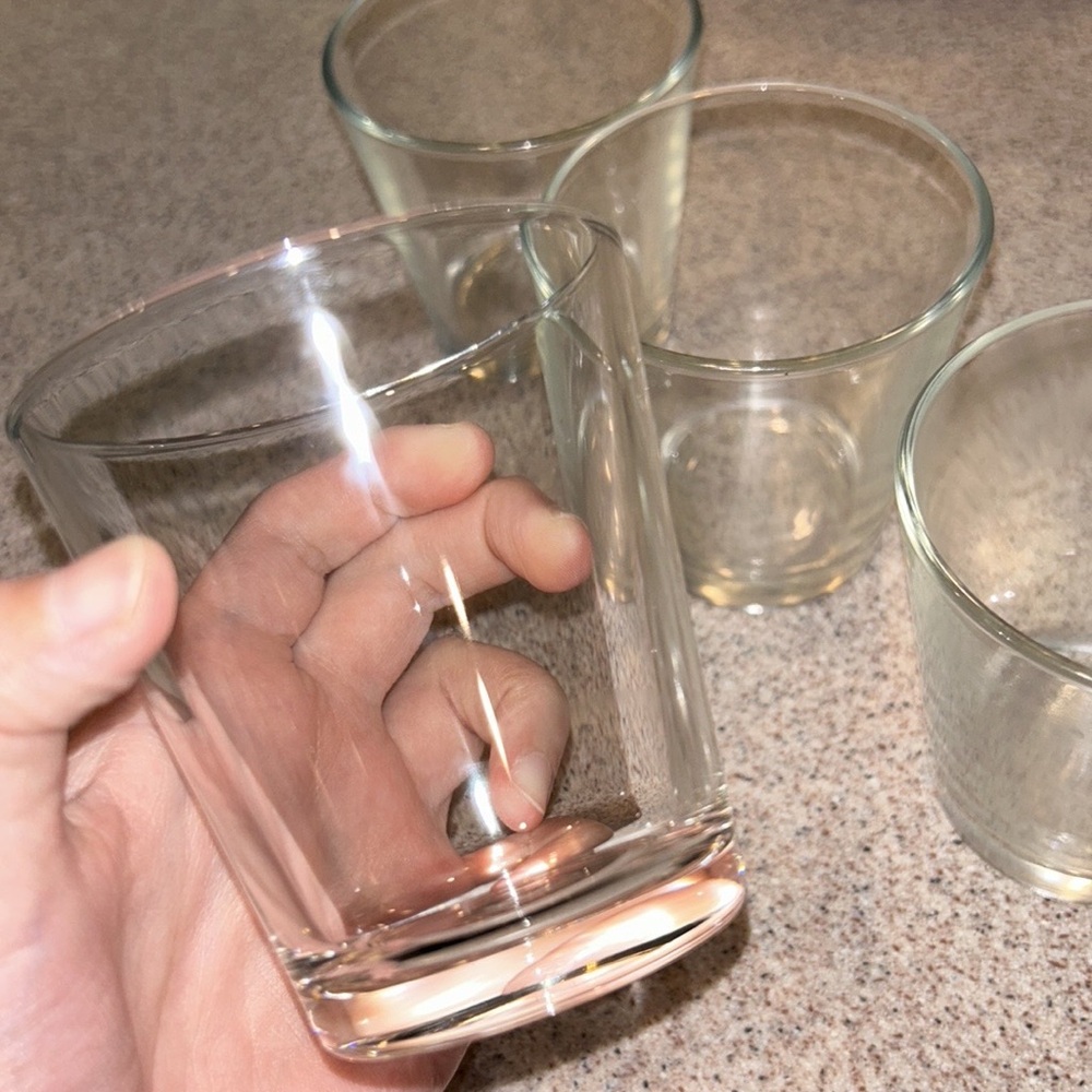 Four small water bottle